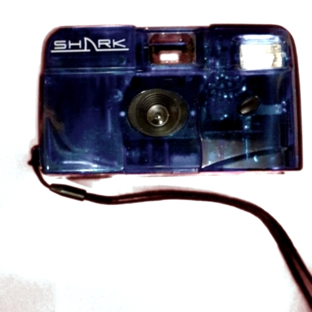 Vintage see through blue Shark disposable camera